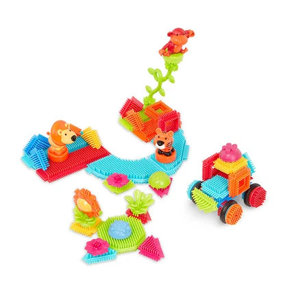 Bristle Blocks Tubo 54 Piezas – Set de bloques de construcción con cerdas suaves que encajan desde cualquier ángulo, incluye ruedas y cubo de almacenaje | De Cáscara de Nuez | construcción, bloques, motricidad, creatividad, outlet
